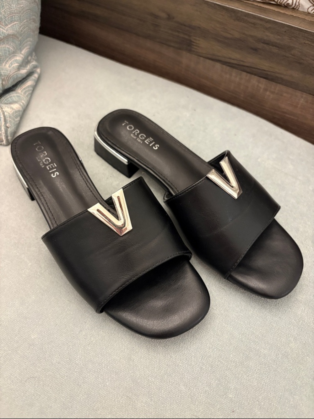 Torgeis Black Slide Mules with Silver V Accent
